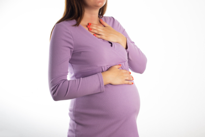 Pregnant Woman Feeling Heartburn - KM NU Hospitals